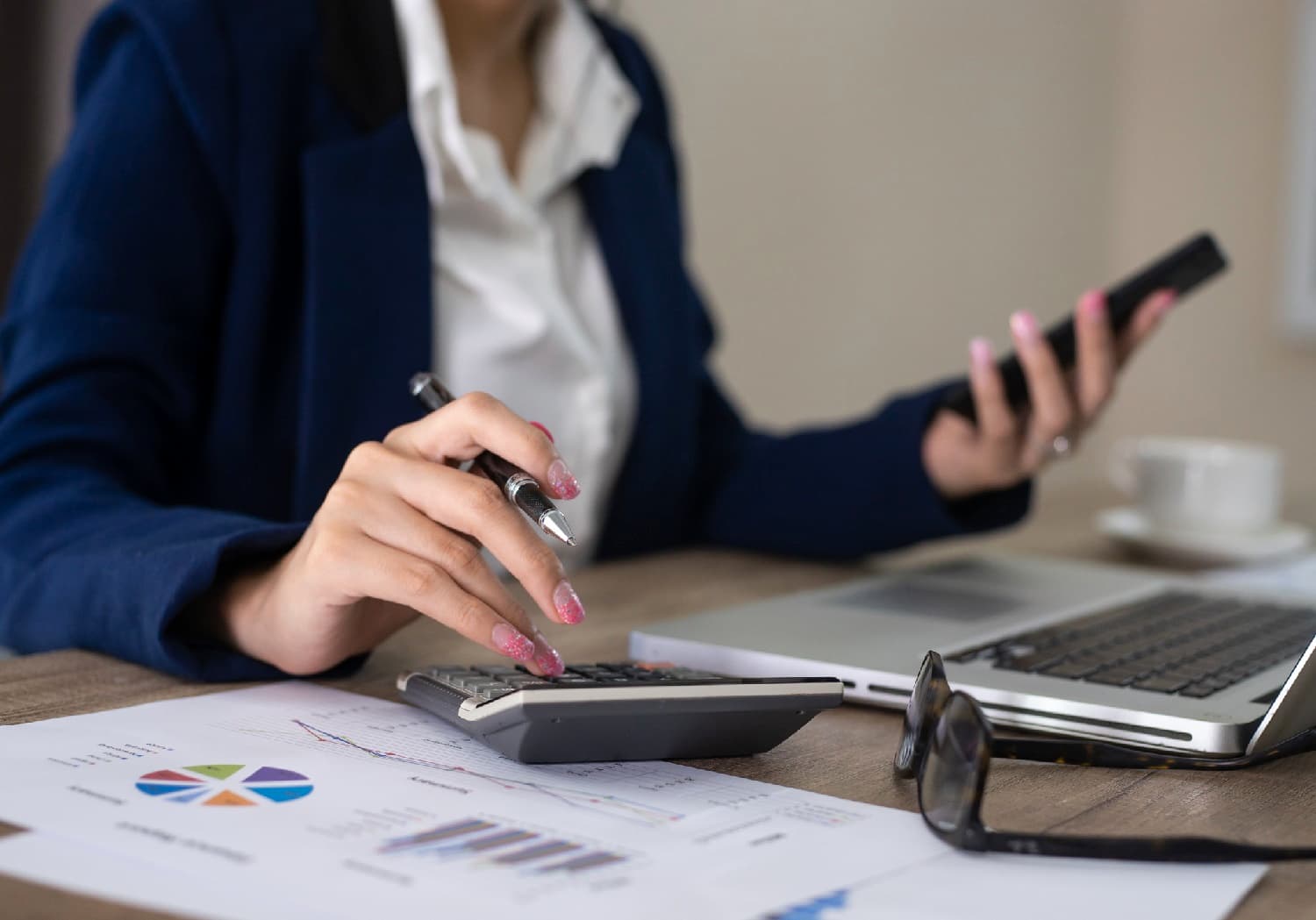 Accountant using a calculator