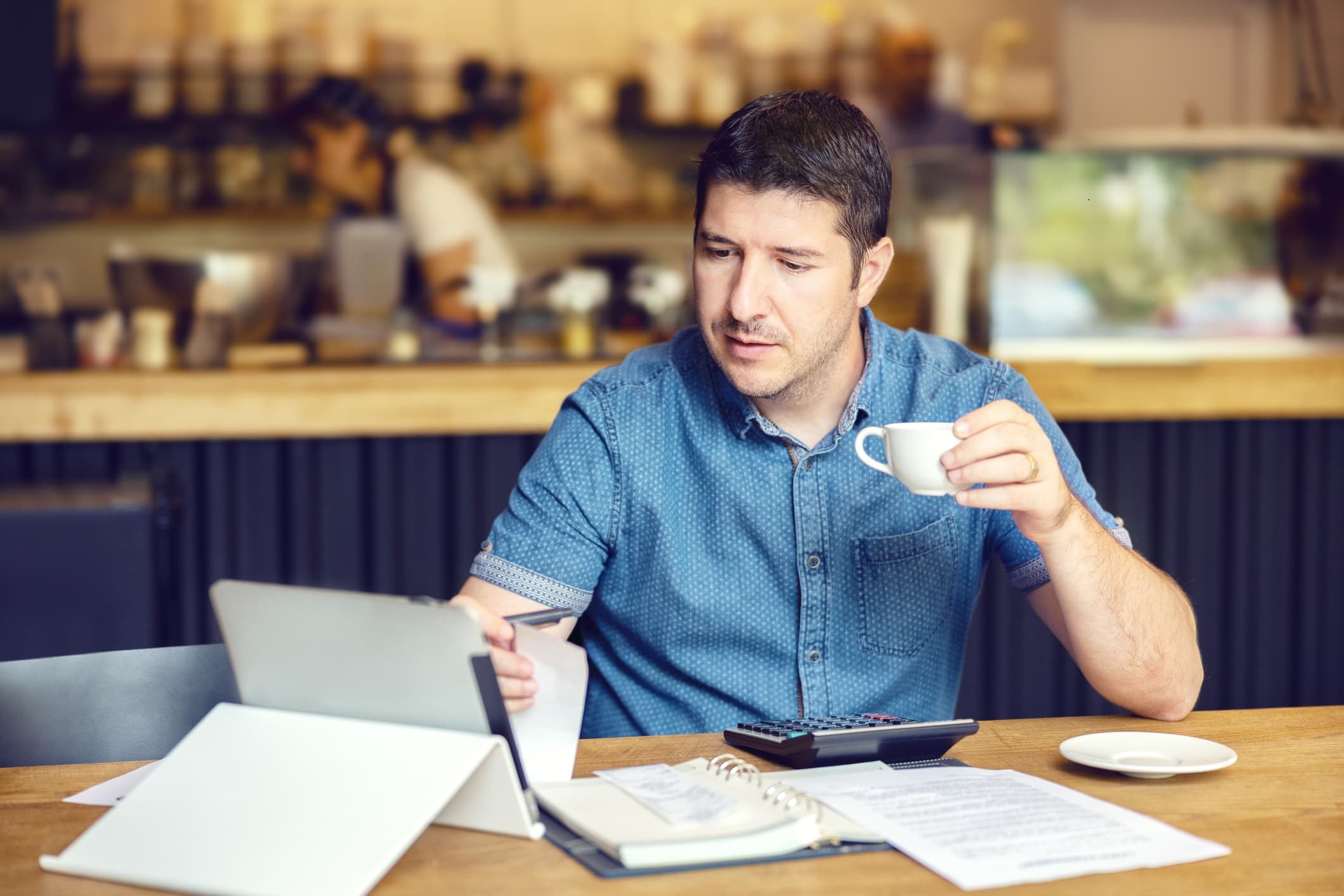 business owner calculating taxes