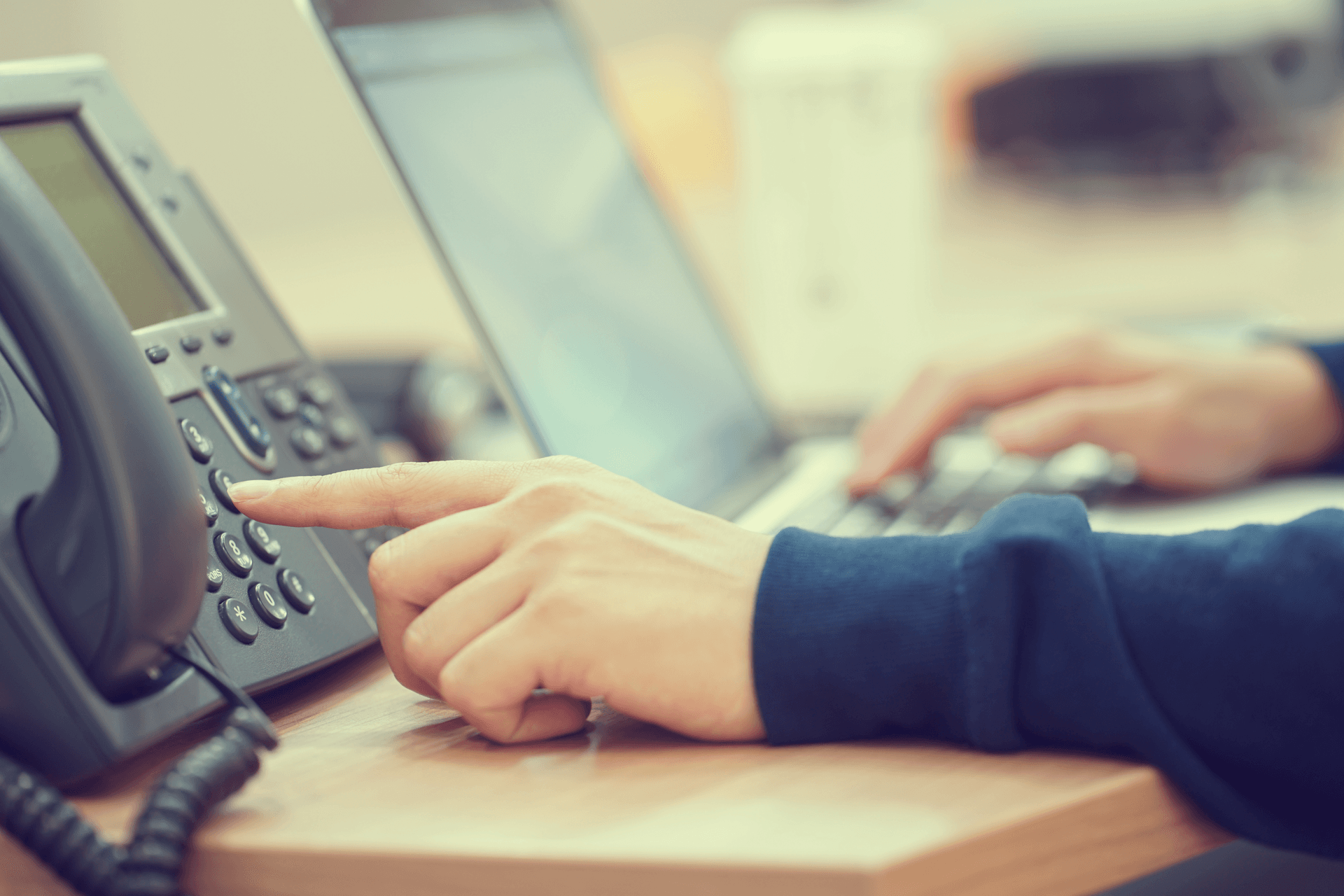 person using an office phone