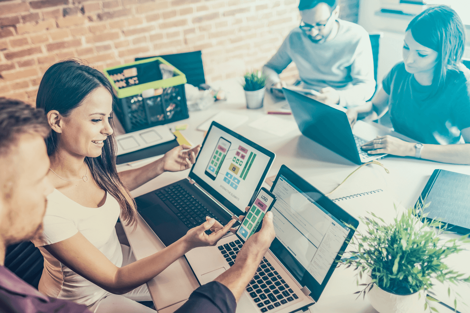 Website designers collaborating in an office